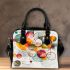 Abstract painting of vibrant colors and shapes shoulder handbag