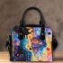 Abstract watercolor painting of the universe shoulder handbag