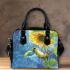 Adorable cartoon frog hanging onto the stem of a sunflower in full bloom shoulder handbag