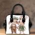 Adorable happy baby bunny couple in green shoulder handbag