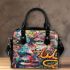 An intricate colorful painting shoulder handbag