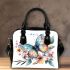 Beautiful colorful butterfly among flowers shoulder handbag