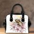 Bee on honeycomb with flowers around shoulder handbag