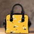 Black bees flying around shoulder handbag