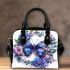 Blue butterfly surrounded by roses and flowers shoulder handbag