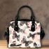 Butterflies and butterfly pattern in soft pink shoulder handbag