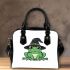 Cartoon green frog wearing black witch hat shoulder handbag