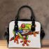 Cartoon tattoo design of a red eyed tree frog sitting on branch shoulder handbag