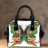 Colorful butterfly with floral designs on its wings shoulder handbag