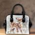 Cute baby deer in the snow shoulder handbag