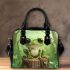 Cute cartoon frog sitting on a tree stump with big eyes shoulder handbag