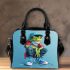 Cute cartoon green frog sitting on top of white sneakers shoulder handbag