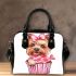 Cute cartoon yorkshire terrier inside a pink cupcake shoulder handbag