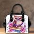Cute owl sitting on books surrounded by pink roses shoulder handbag