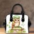 Cute owl wearing a green beret sitting on books shoulder handbag