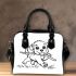 Cute puppy playing with a stick coloring page for kids shoulder handbag