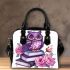 Cute purple owl sitting on top of books surrounded shoulder handbag