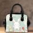 Cute white rabbit sitting on the swing shoulder handbag