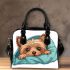 Cute yorkshire terrier dog peeking shoulder handbag