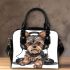 Cute yorkshire terrier dog wearing headphones shoulder handbag