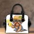 Cute yorkshire terrier in a summer hat and sunglasses holding shoulder handbag