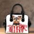 Cute yorkshire terrier inside an open present box shoulder handbag