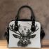 Deer head with large antlers and forest shoulder handbag