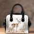 Deer with antlers stands in the forest shoulder handbag