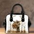 Deer with large antlers stands in the forest shoulder handbag