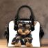 Frontal picture of a cute yorkshire terrier puppy shoulder handbag