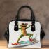 Happy frog wearing sunglasses surfing on a surfboard while holding shoulder handbag