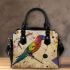 Lines to create patterns around parrot itself shoulder handbag