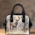 Majestic deer with impressive antlers standing in the forest shoulder handbag