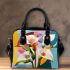 Painting of calla lilies in bold geometric shapes shoulder handbag