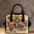 Queen bee sitting on top of honeycomb shoulder handbag