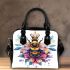 Queen bee with a crown sitting on flower shoulder handbag