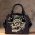 Skull with green frog on top shoulder handbag