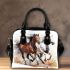 Three horses are galloping in the wind shoulder handbag