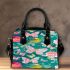 Vibrant pattern of pink and turquoise butterflies shoulder handbag