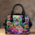 Vibrantly colored psychedelic frog sitting on top of an egg shoulder handbag