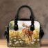 Whitetailed buck standing in meadow with daisies shoulder handbag