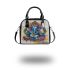 Abstract art graffiti with blue and purple shapes shoulder handbag