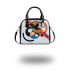 Abstract composition of circles and lines shoulder handbag