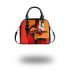 Abstract composition of geometric shapes in red shoulder handbag