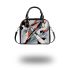 Abstract composition of simple shapes shoulder handbag