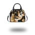 Abstract gold black and white with geometric shapes shoulder handbag