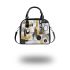 Abstract gold black and white with geometric shapes shoulder handbag