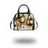 Abstract gold black and white with geometric shapes shoulder handbag