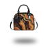 Abstract illustration of an outstretched hand shoulder handbag
