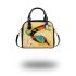Abstract modern painting of an exotic bird shoulder handbag